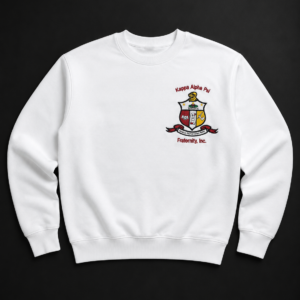 Custom full-color embroidered crewneck sweatshirt with multi-thread heraldic crest, helmet figure, gold stars, shield panels, ribbon scroll, and arched organization text.