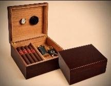 Cherry-finish wood humidor open to show Spanish cedar interior filled with cigars, hygrometer and humidifier in the lid