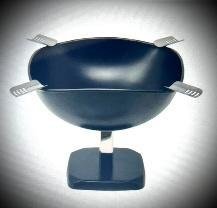 Matte black raised quadrangle cigar ashtray on a pedestal base with four stainless cigar rests