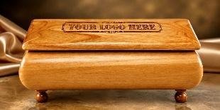 Red alder wood keepsake box on ball feet with an engraved "YOUR LOGO HERE" plaque on the lid