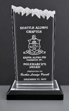 Clear crystal award with a jagged chiselled top on a black base, engraved with a chapter crest and presentation text